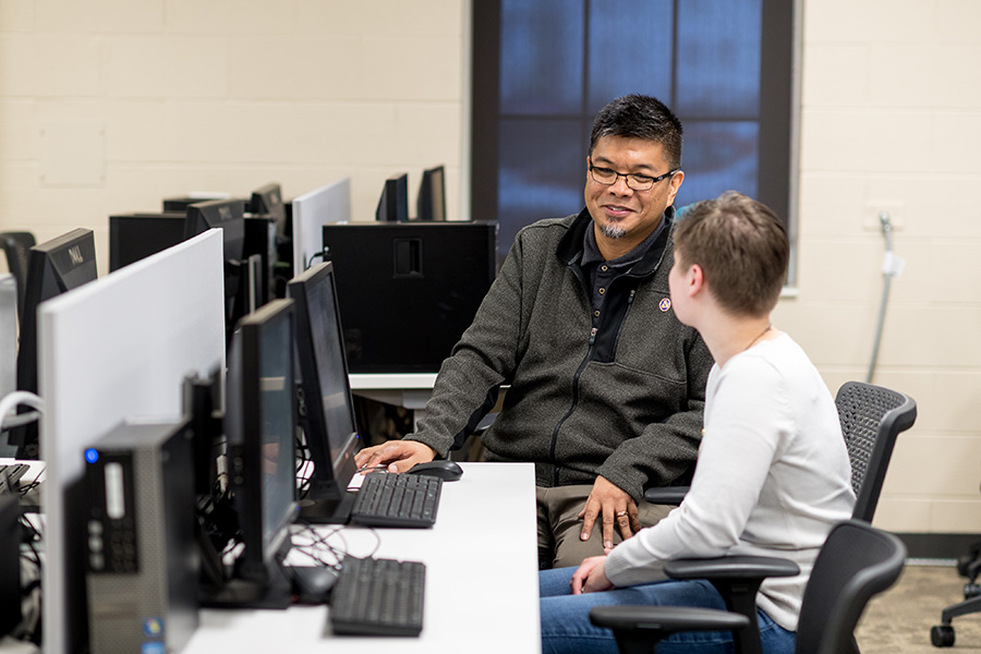 Jerry Gannod working with a student.