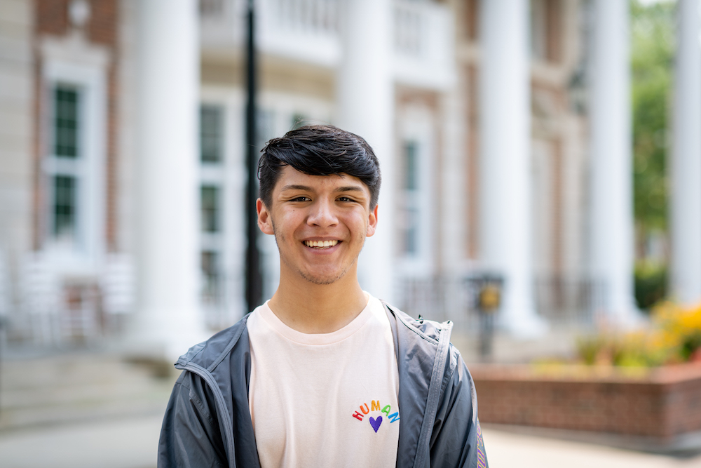 Antonio Pedro stands in front of Oakley Hall.