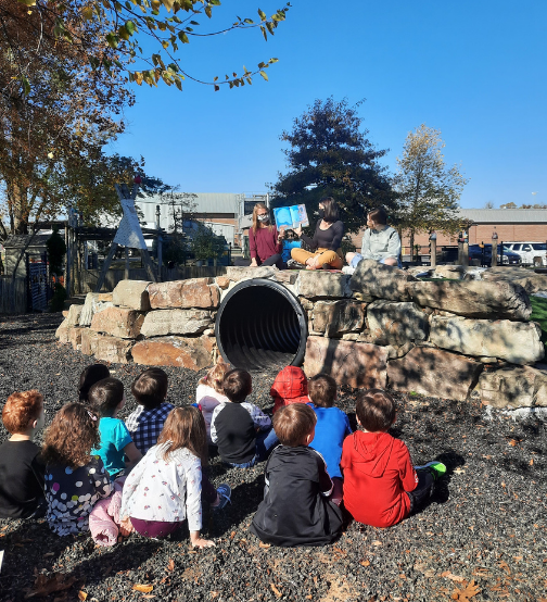 Students reading to CDL