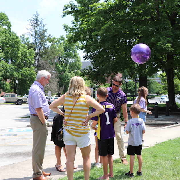 Brandon Boyd and family talk with President Oldham. 