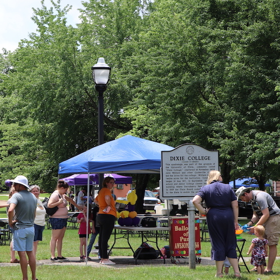 Event attendees standing on the Quad 