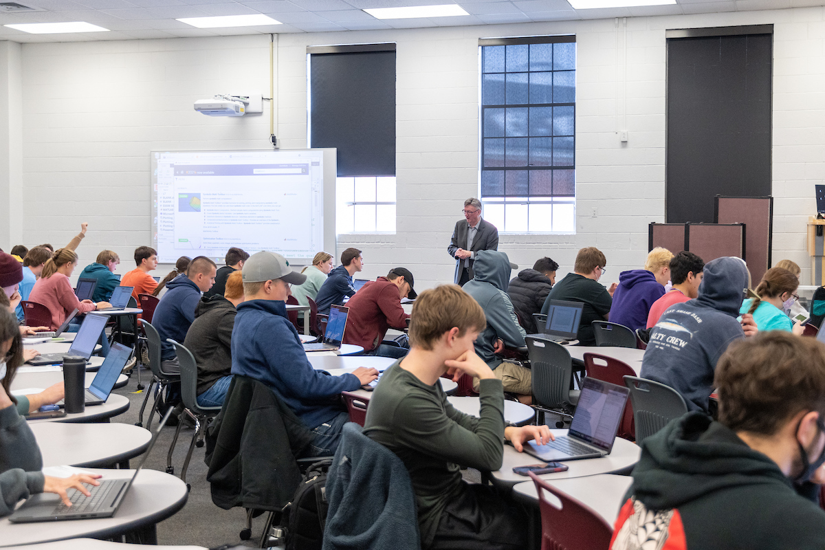 A photo of a lecture hall full of students in an introductory engineering course.