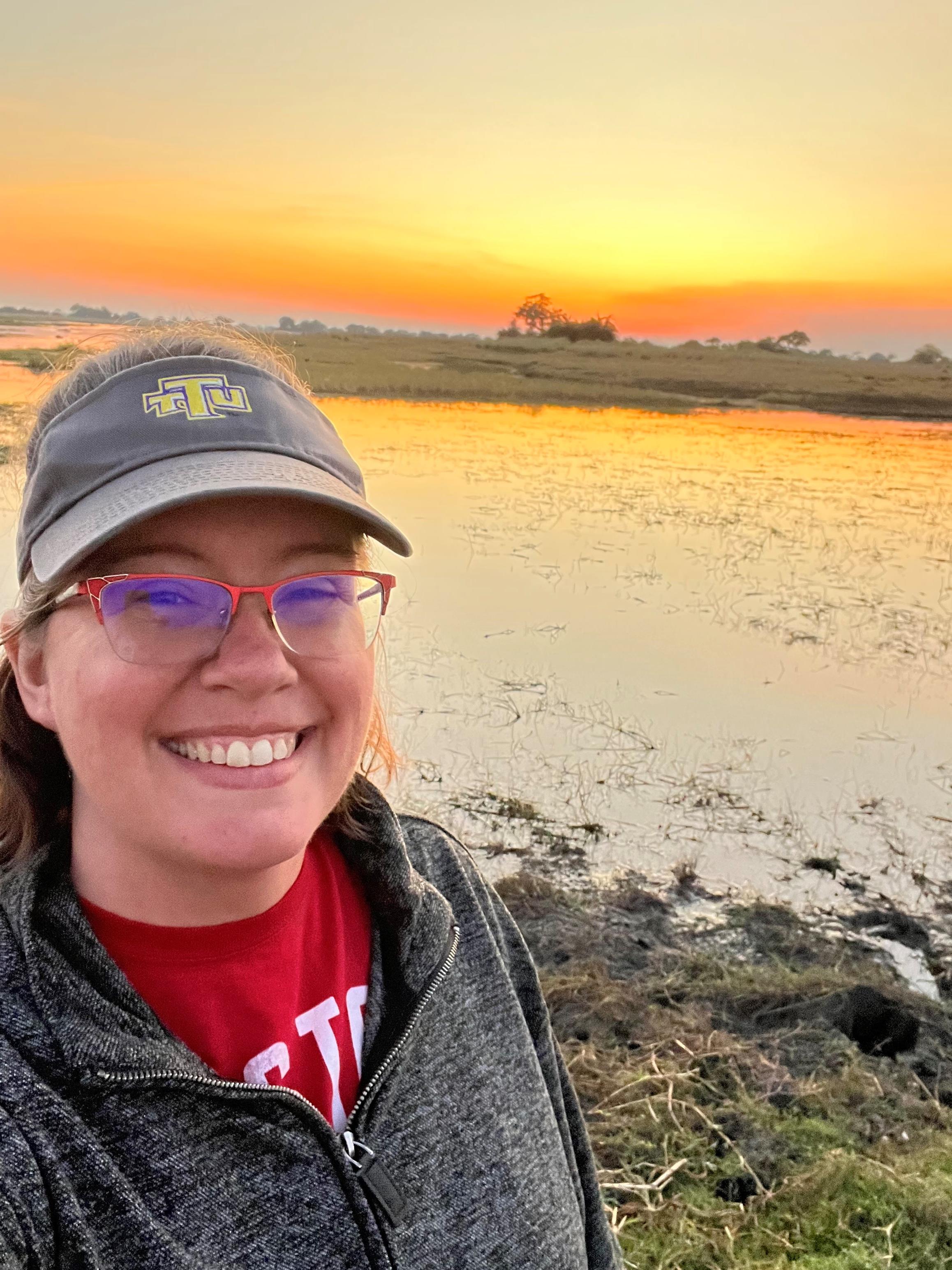 Elaine Tilley in front of a sunset