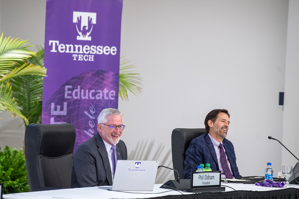 A photo of President Oldham and Board of Trustees member Tom Jones