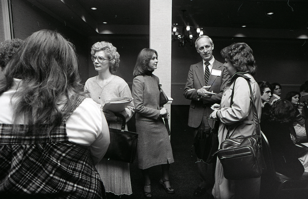 A group of alumni mingle at an event in Nashville.