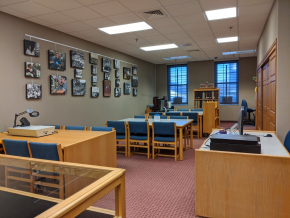 A photo of the archives space with tables and chairs