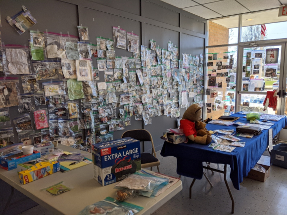 a room full of photos and items recovered from the tornadoes