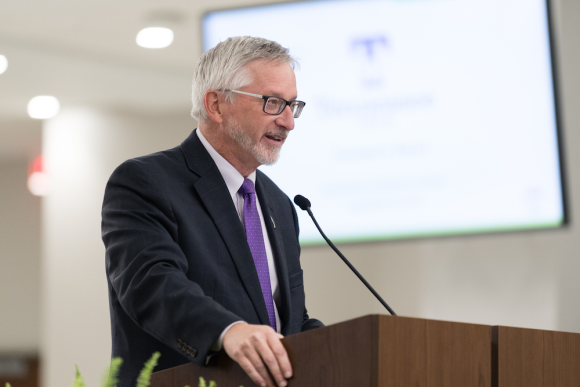 Dr. Philip Oldham addresses board of trustees